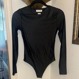 Aritzia Babaton Black Long Sleeve bodysuit sz. XS.